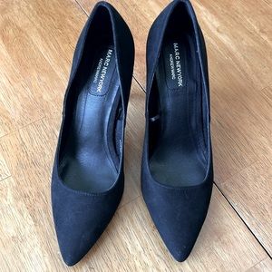 Women’s wide high heel pumps.